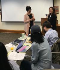 Wang Zheng and Anna Kirkland greet the seminar participants in Lane Hall