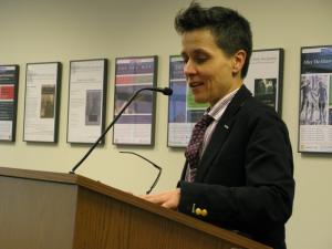 photo of Nadine Hubbs at lectern in Lane Hall, LGQRI event