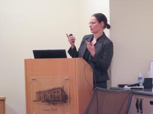photo of Sarah Heinz speaking at lectern in Lane Hall