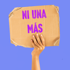 Ni Uns Más written on a cardboard sign.