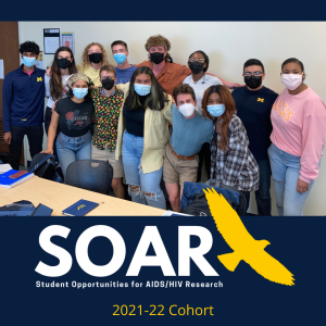 photo of a group of students in a classroom wearing masks. the SOAR logo is at the bottom