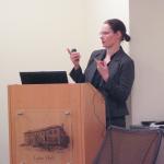 photo of Sarah Heinz speaking at lectern in Lane Hall