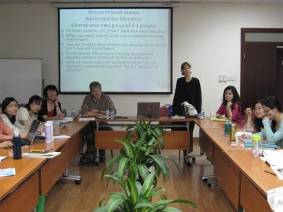 color photo of university classroom in China where students participate in a group discussion